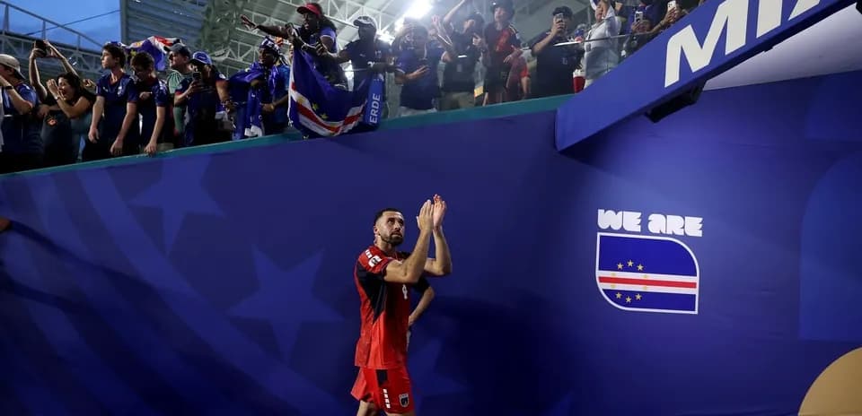 Player applauding fans after the match