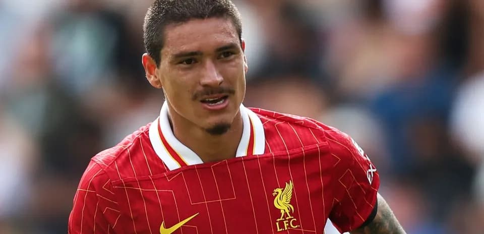Player wearing Liverpool kit during a match