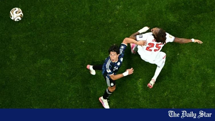 Two players contesting for the ball during match