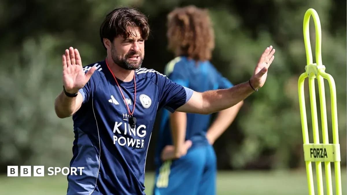 Coach giving instructions during training session