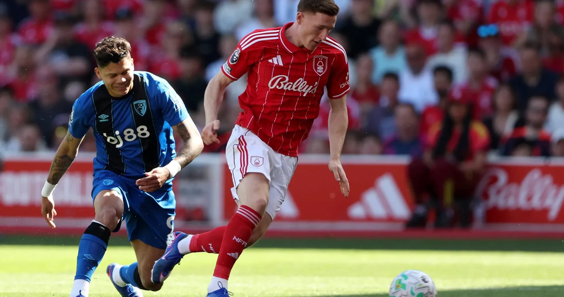 Nottingham Forest player dribbling against Bournemouth