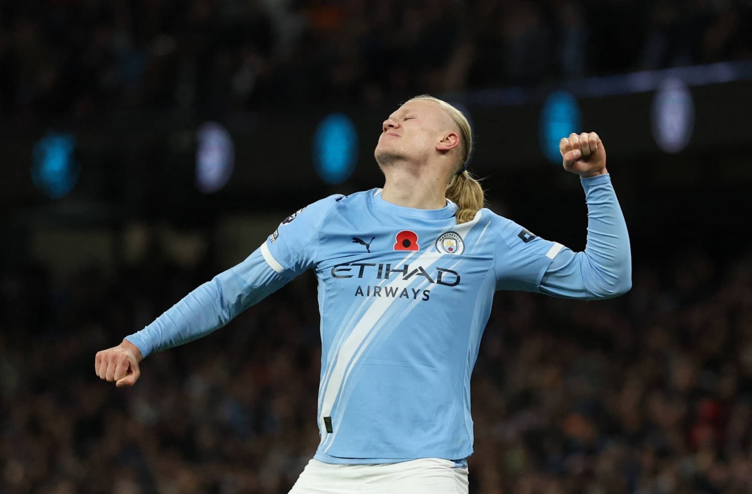 Manchester City player celebrating a goal