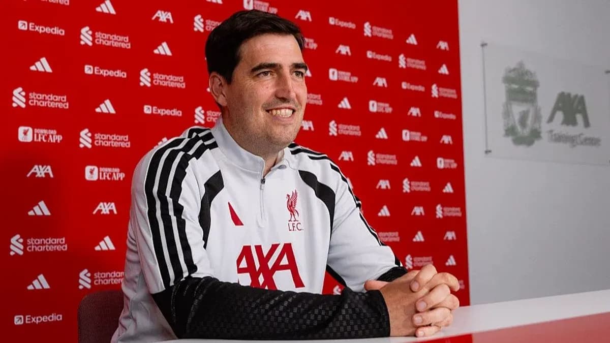 Coach at press conference in training center