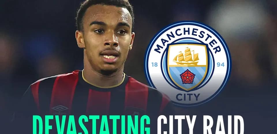 Player in black and red jersey with Manchester City logo