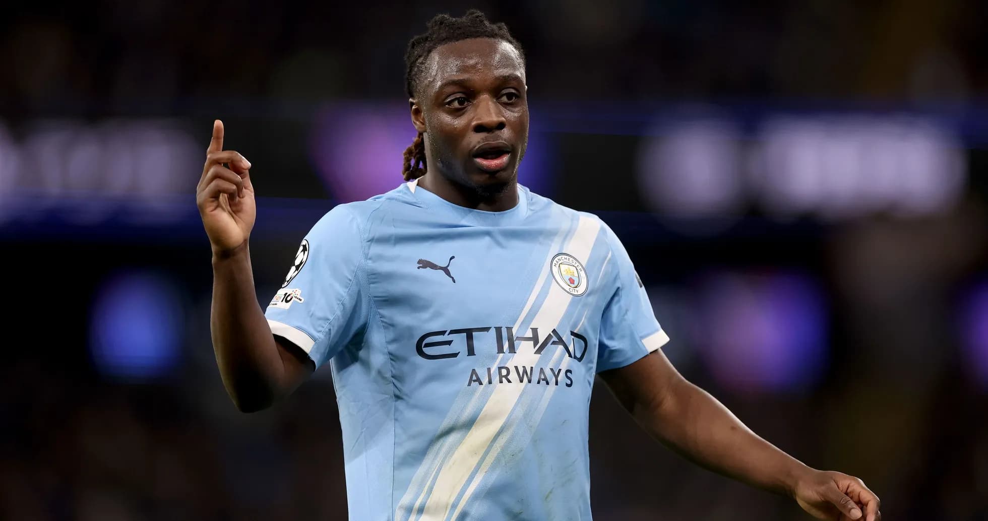 Player gesturing during a Manchester City match