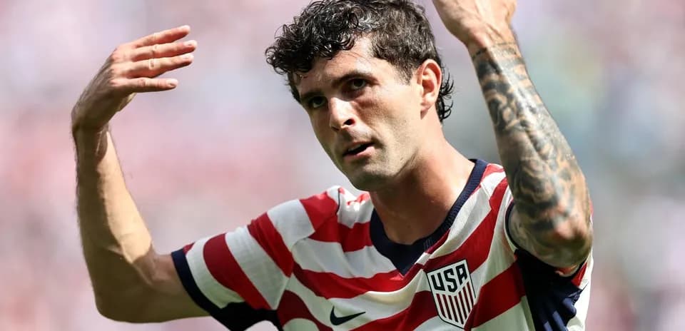 Player gesturing during soccer match for USA team
