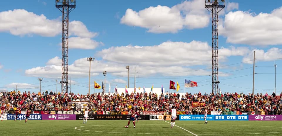 Fans cheering during Detroit City match