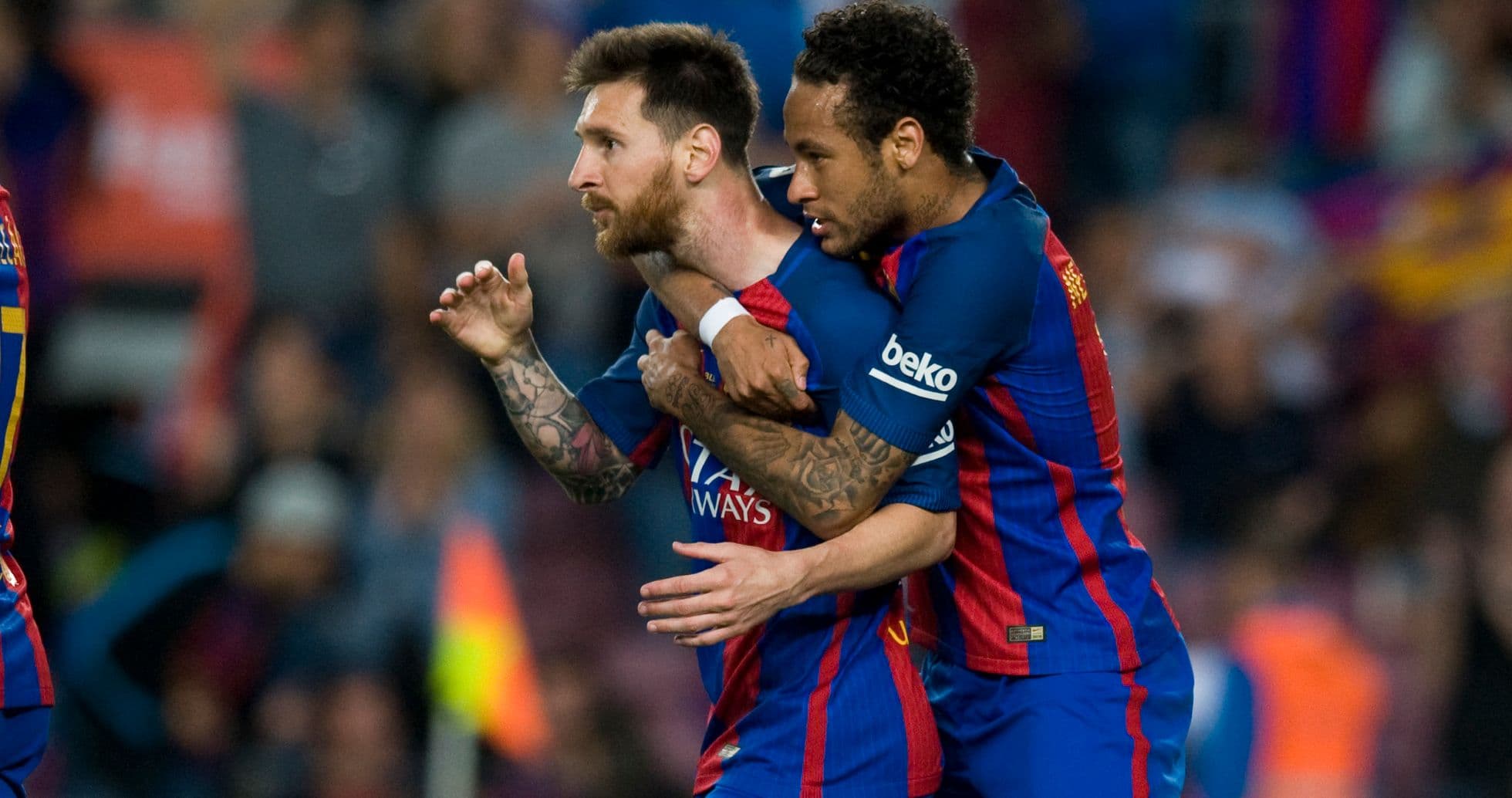 Messi celebrating with Neymar during match