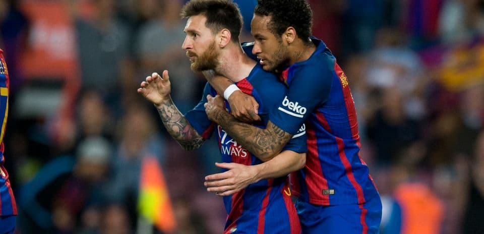 Messi celebrating with Neymar during match
