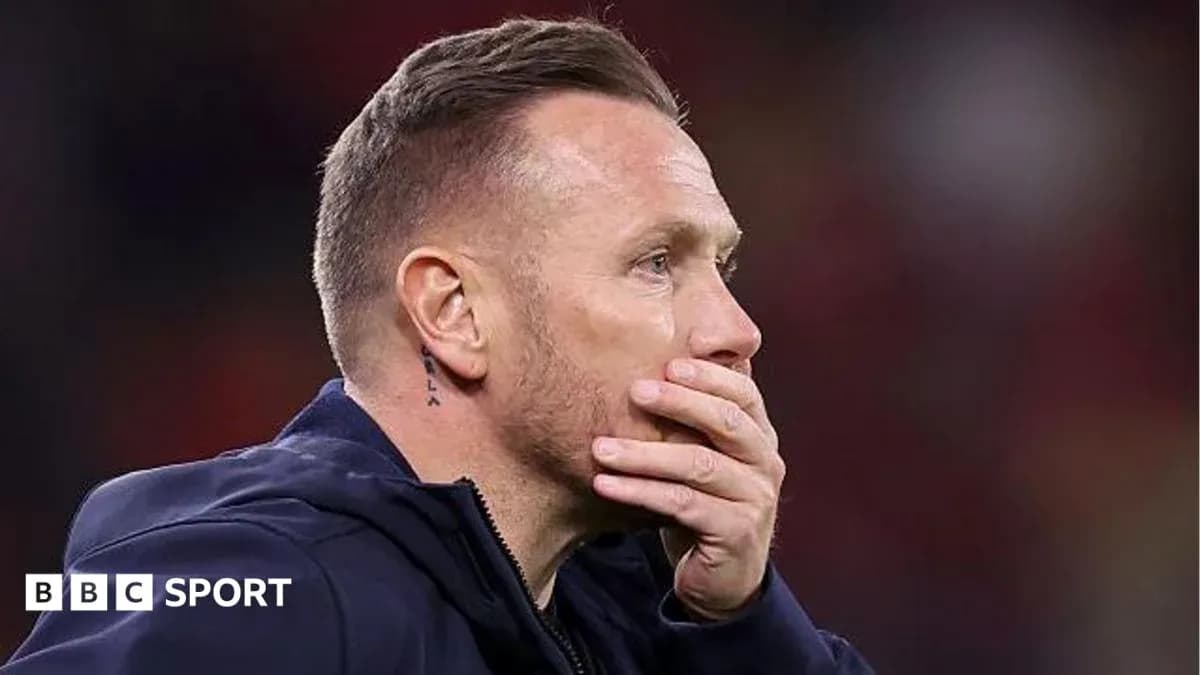 Coach covering mouth during match observation