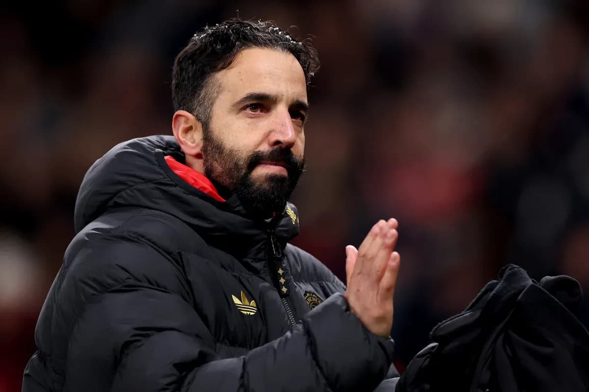 Coach applauding fans after match in stadium