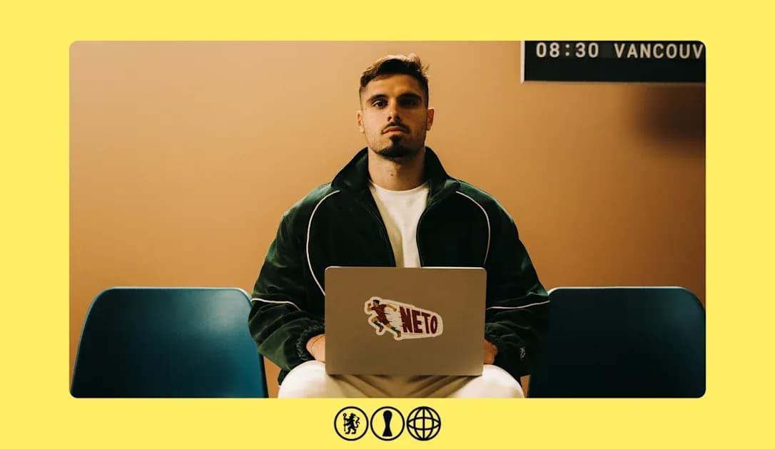 Person seated with laptop in waiting area