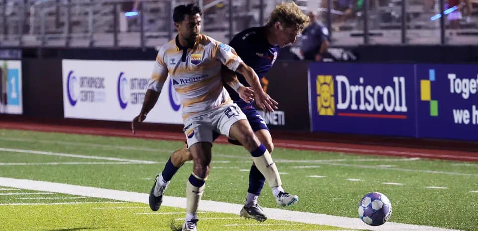 Player tackling during One Knoxville match