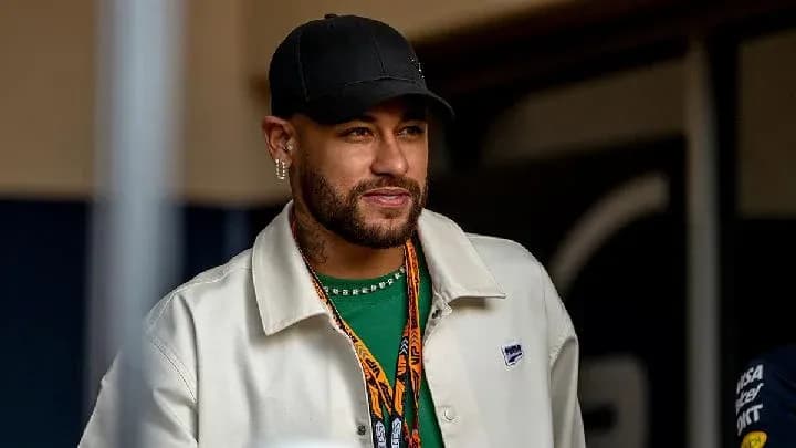 Man in casual attire smiling at event