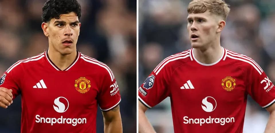 Two Manchester United players in red kits