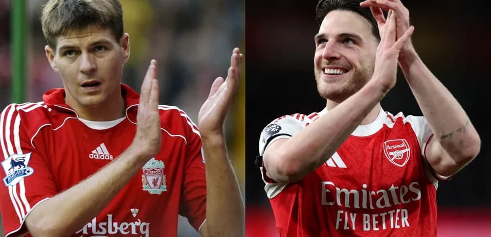 Two football players applauding fans in team jerseys