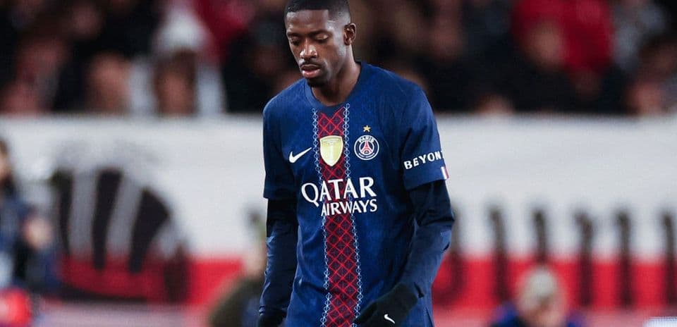 Player walking with head down on the pitch