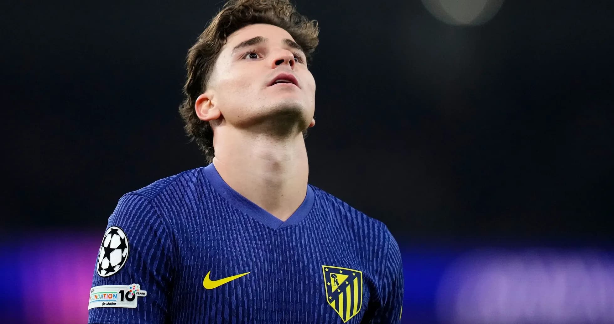 Atletico Madrid player looking upwards during match