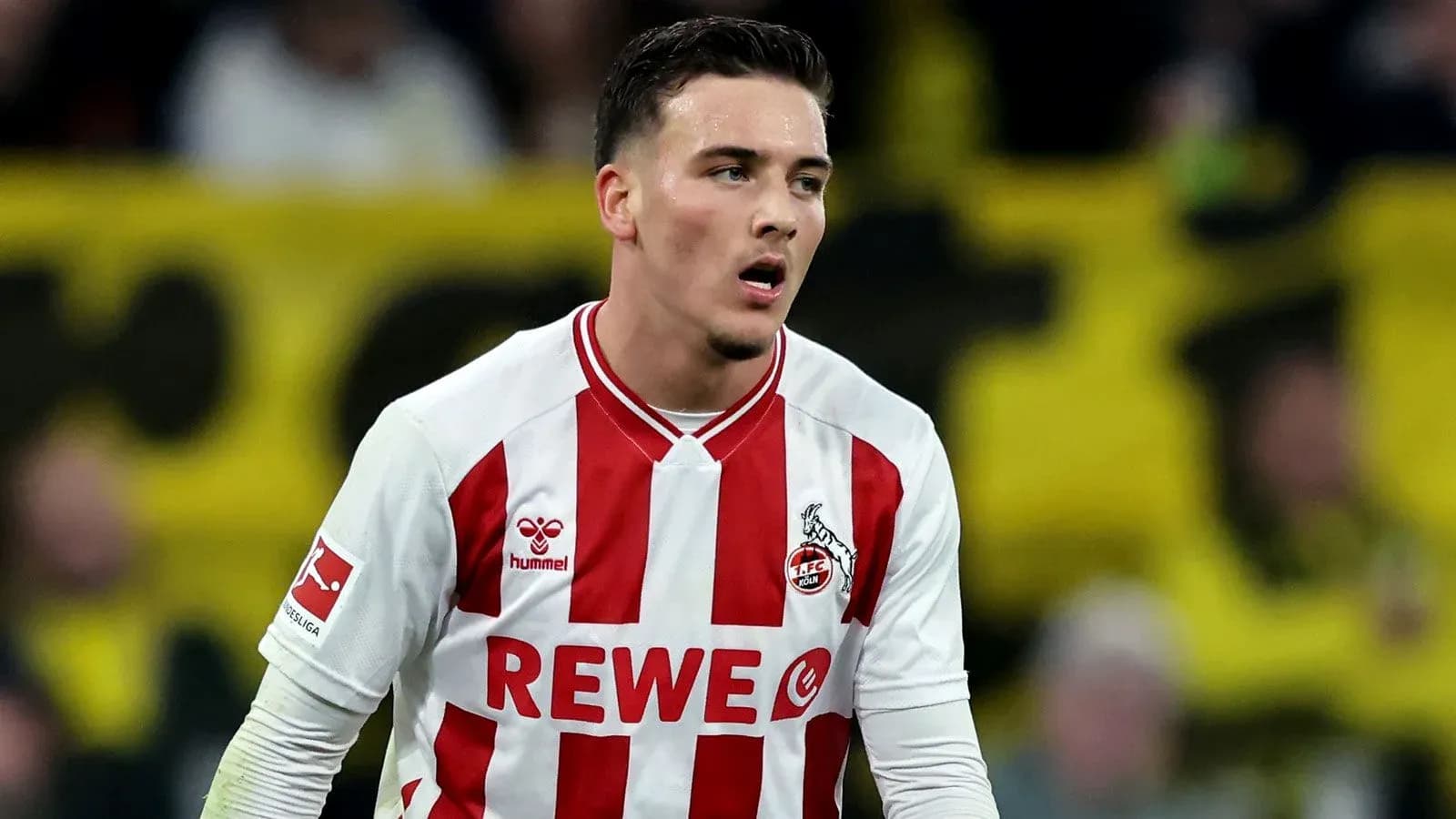 Player in FC Köln kit during match action