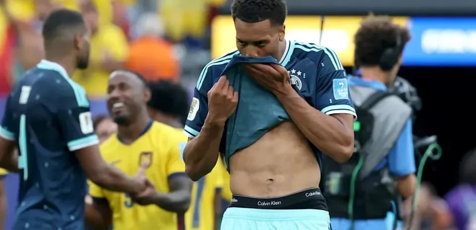 Player removing shirt after match with Ecuador