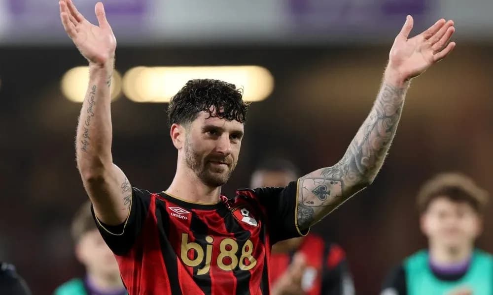Player celebrating with raised hands after match