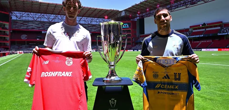 Players holding jerseys before CONCACAF Champions League match