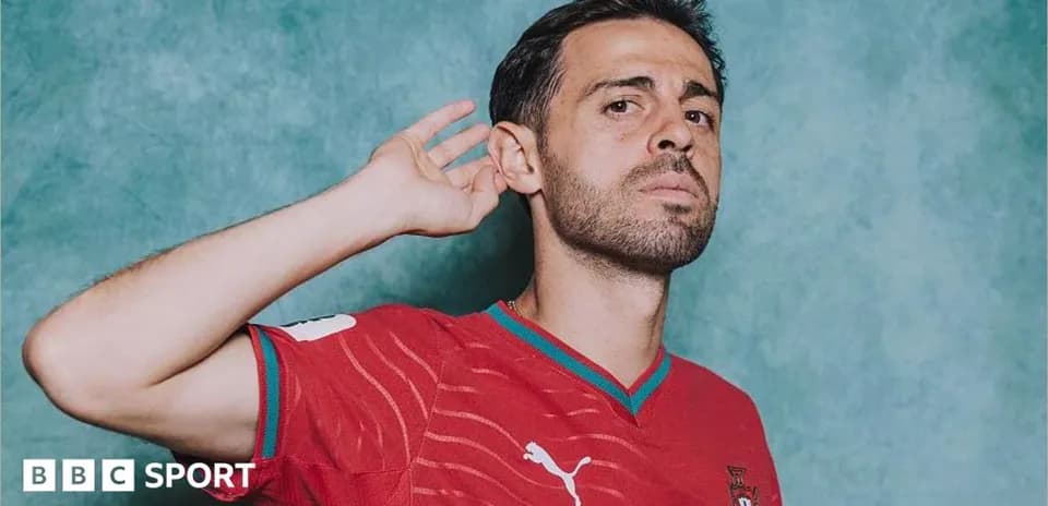 Player posing in Portugal national team jersey