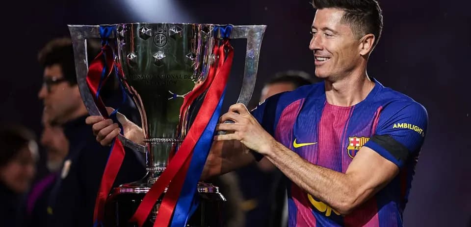 Player holding trophy during celebration ceremony
