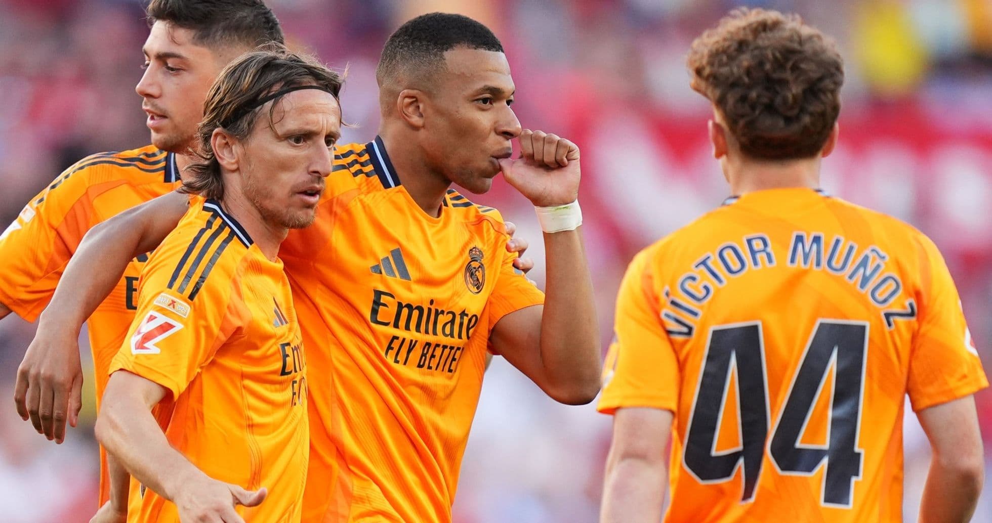 Real Madrid players celebrating a goal Real Madrid players celebrating a goal