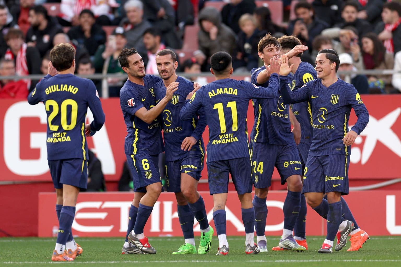 Atletico Madrid players celebrating a goal Atletico Madrid players celebrating a goal