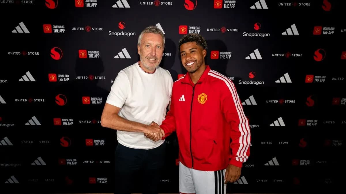 Player shaking hands during club announcement event Player shaking hands during club announcement event