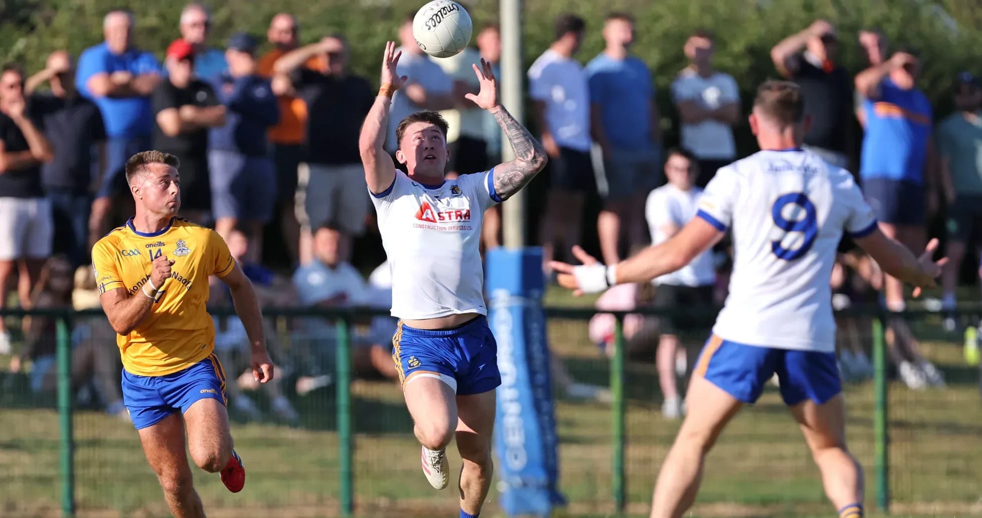 Player catching a ball during a rugby match Player catching a ball during a rugby match