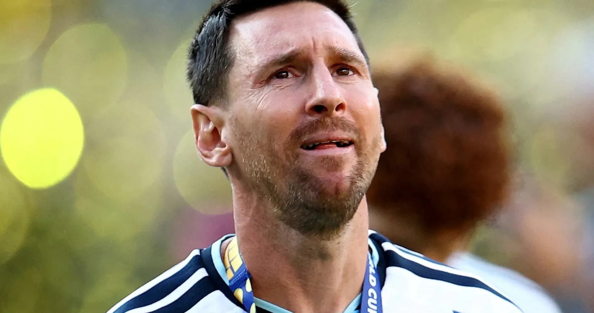 Player with medal celebrating after match Player with medal celebrating after match
