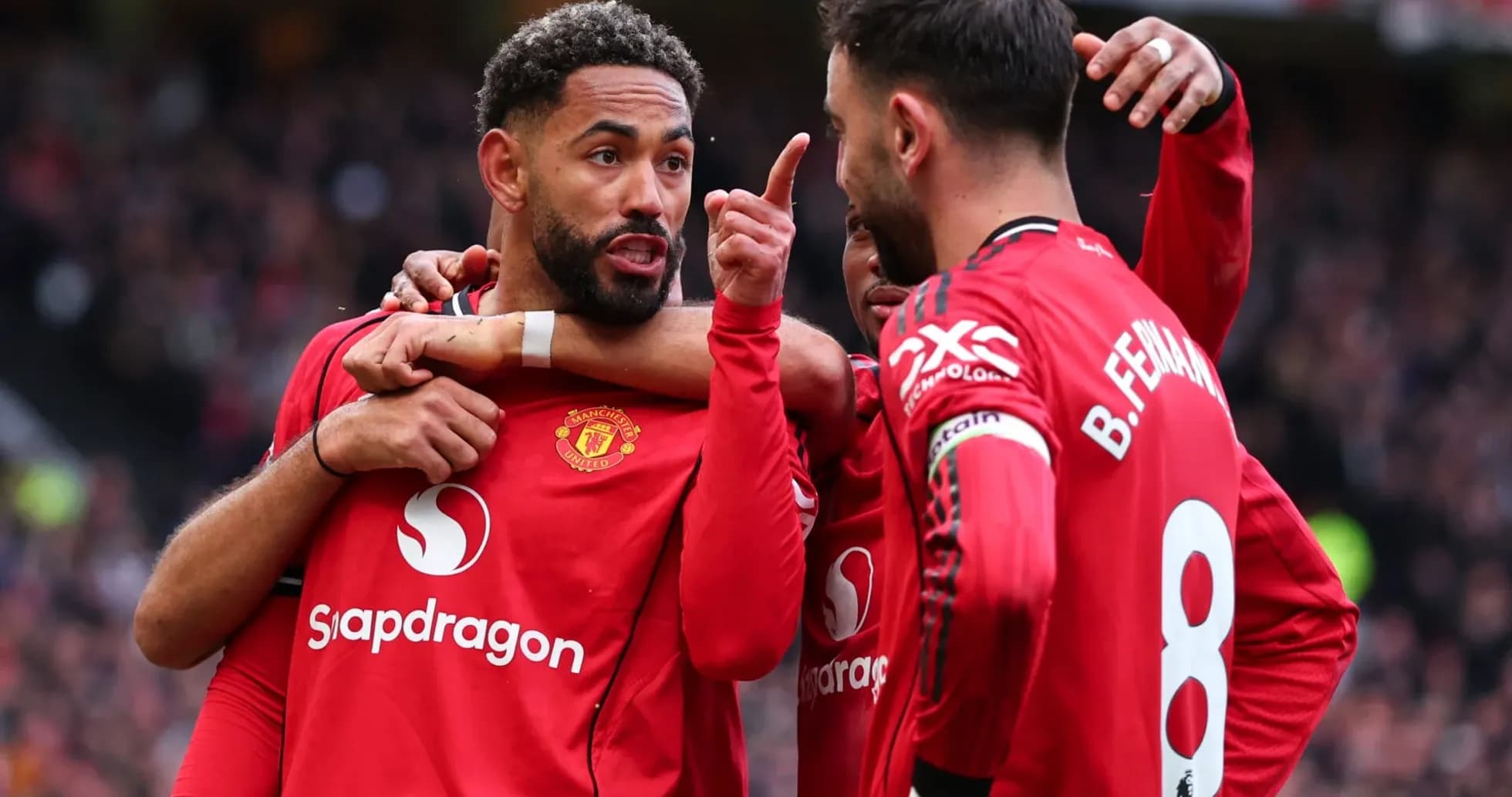 Manchester United players celebrating during a match Manchester United players celebrating during a match