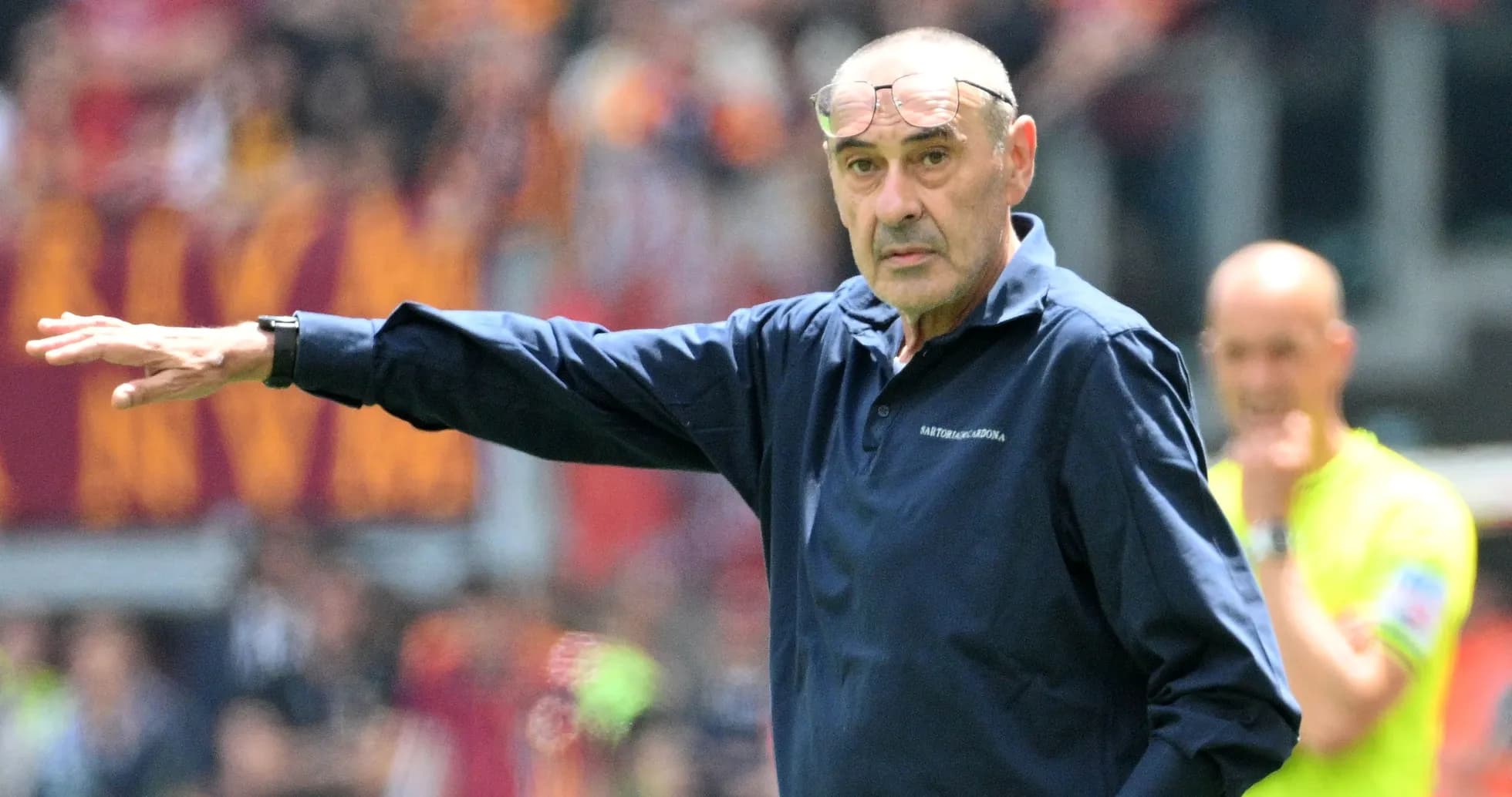 Manager gesturing during a match on the sidelines Manager gesturing during a match on the sidelines
