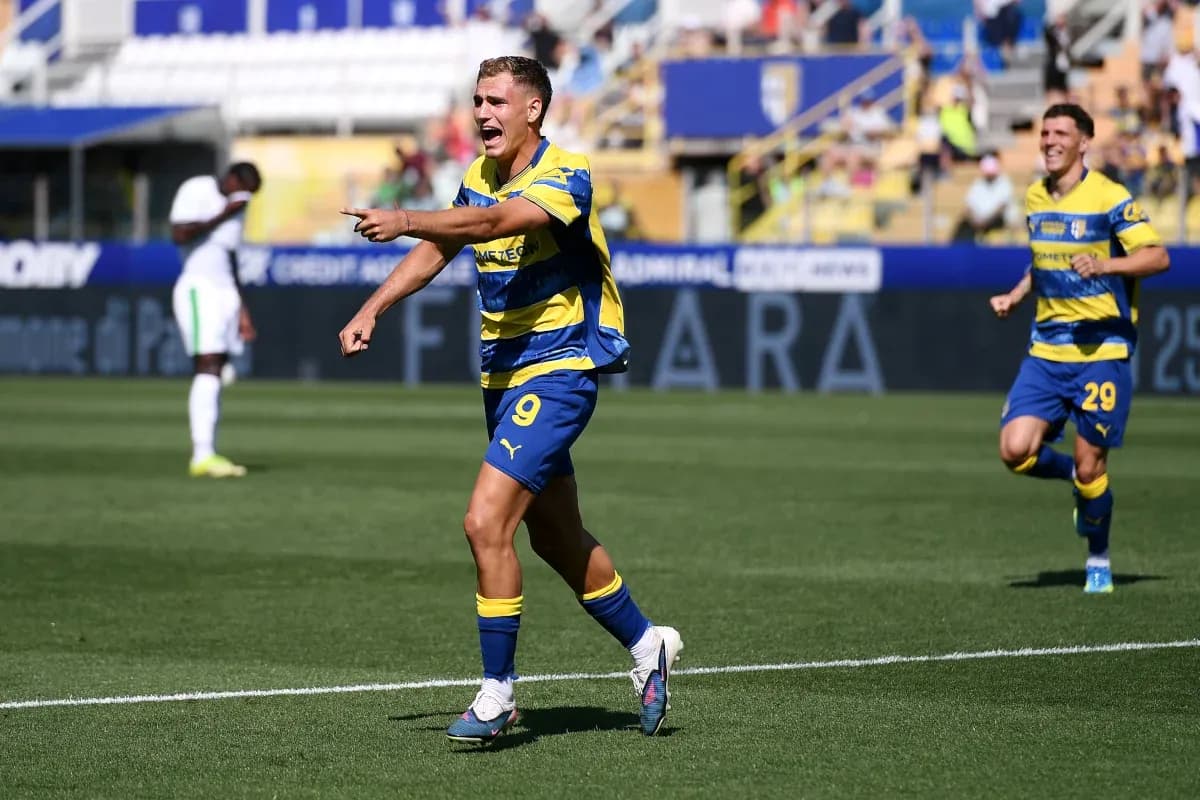 Parma players celebrating a goal during match Parma players celebrating a goal during match