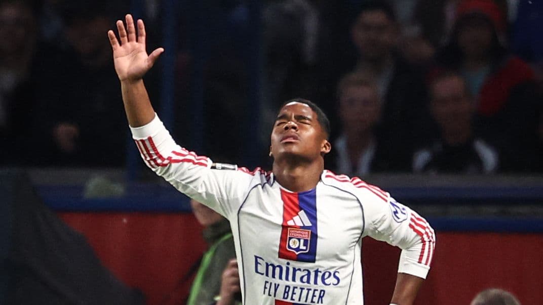 Player gesturing during a match in stadium Player gesturing during a match in stadium
