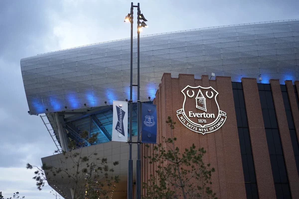 Everton stadium exterior with club logo and banners Everton stadium exterior with club logo and banners
