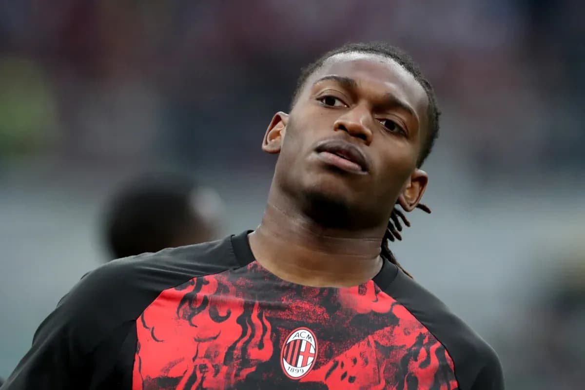 Player warming up in AC Milan training jersey Player warming up in AC Milan training jersey