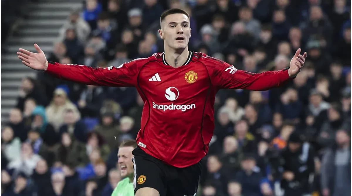 Player celebrating after scoring for Manchester United Player celebrating after scoring for Manchester United