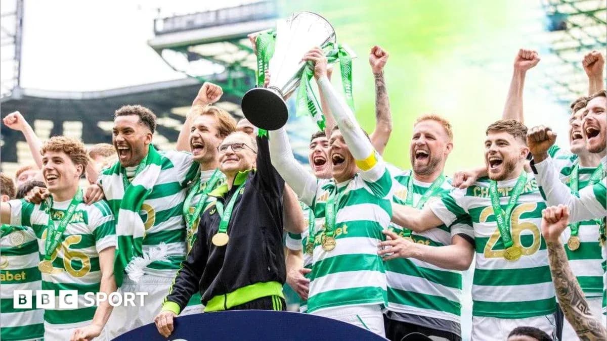 Celtic players celebrating with the trophy Celtic players celebrating with the trophy