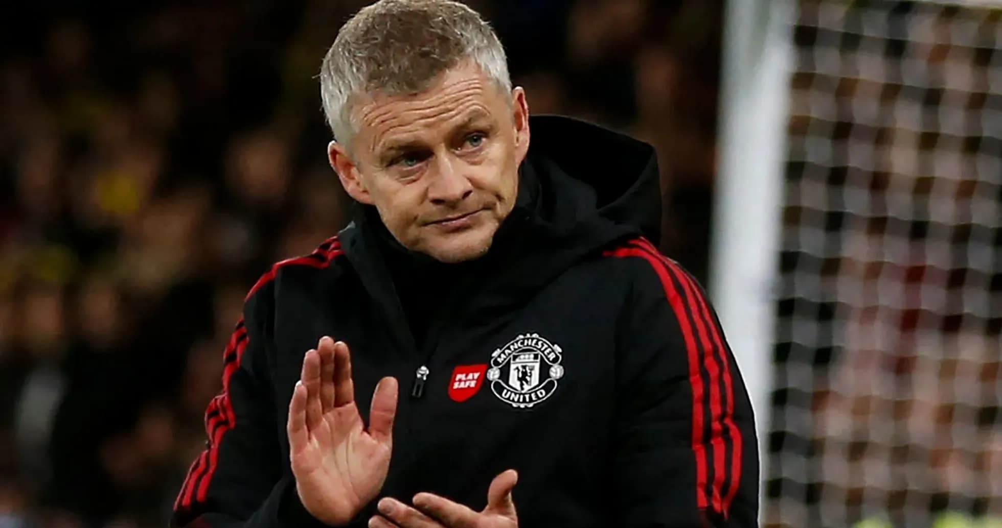 Manager gesturing during a match on the sideline Manager gesturing during a match on the sideline