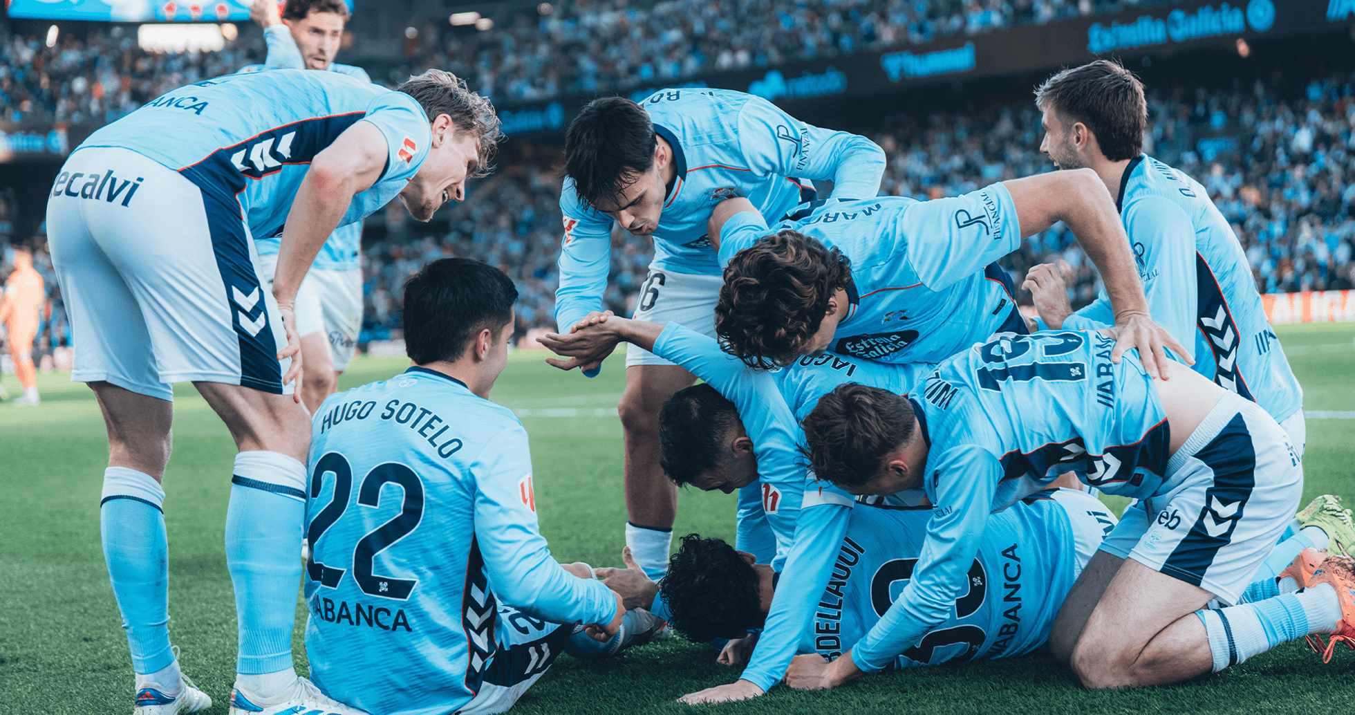 Celta Vigo players celebrating a goal Celta Vigo players celebrating a goal