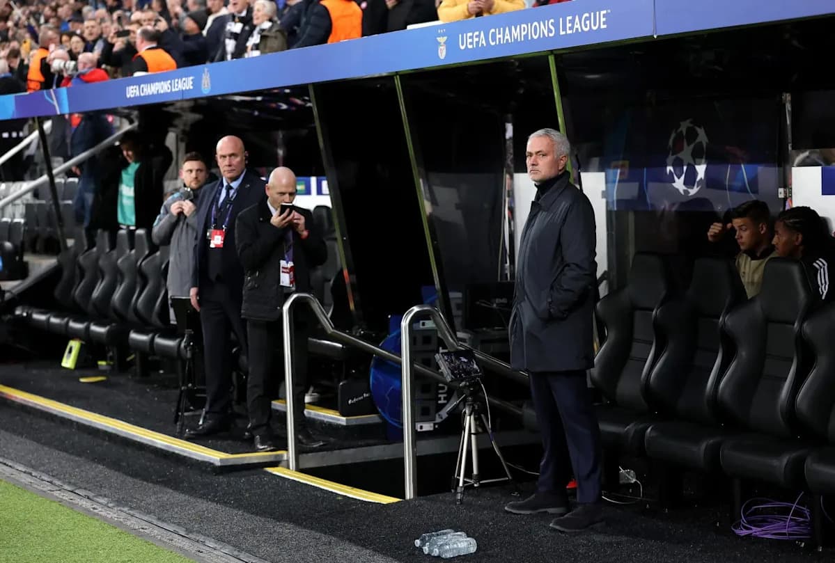 Manager observing from the dugout during match Manager observing from the dugout during match