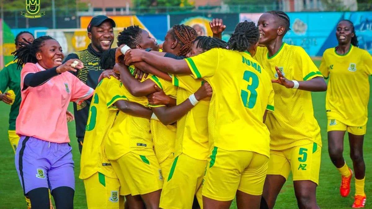 Players celebrating a goal during match Players celebrating a goal during match