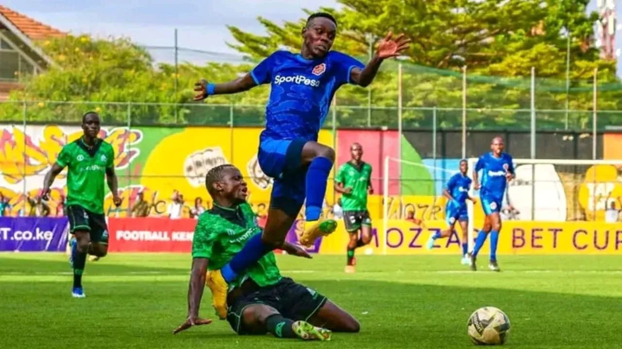Player from Murang'a SEAL tackling Mara Sugar player Player from Murang'a SEAL tackling Mara Sugar player