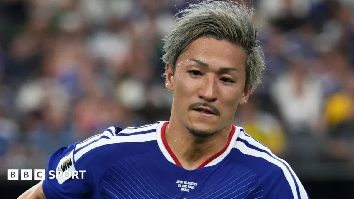 Player in blue jersey running during soccer match Player in blue jersey running during soccer match