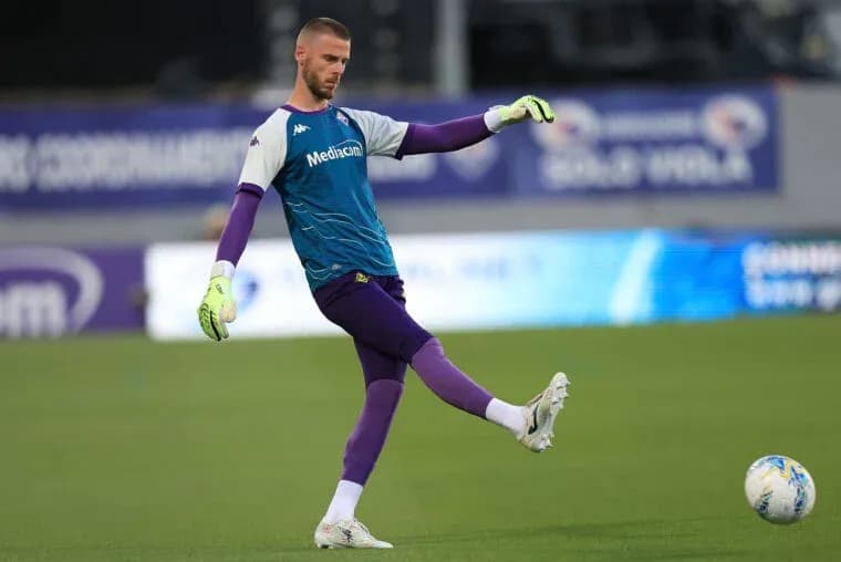 Goalkeeper practicing kick during training session Goalkeeper practicing kick during training session