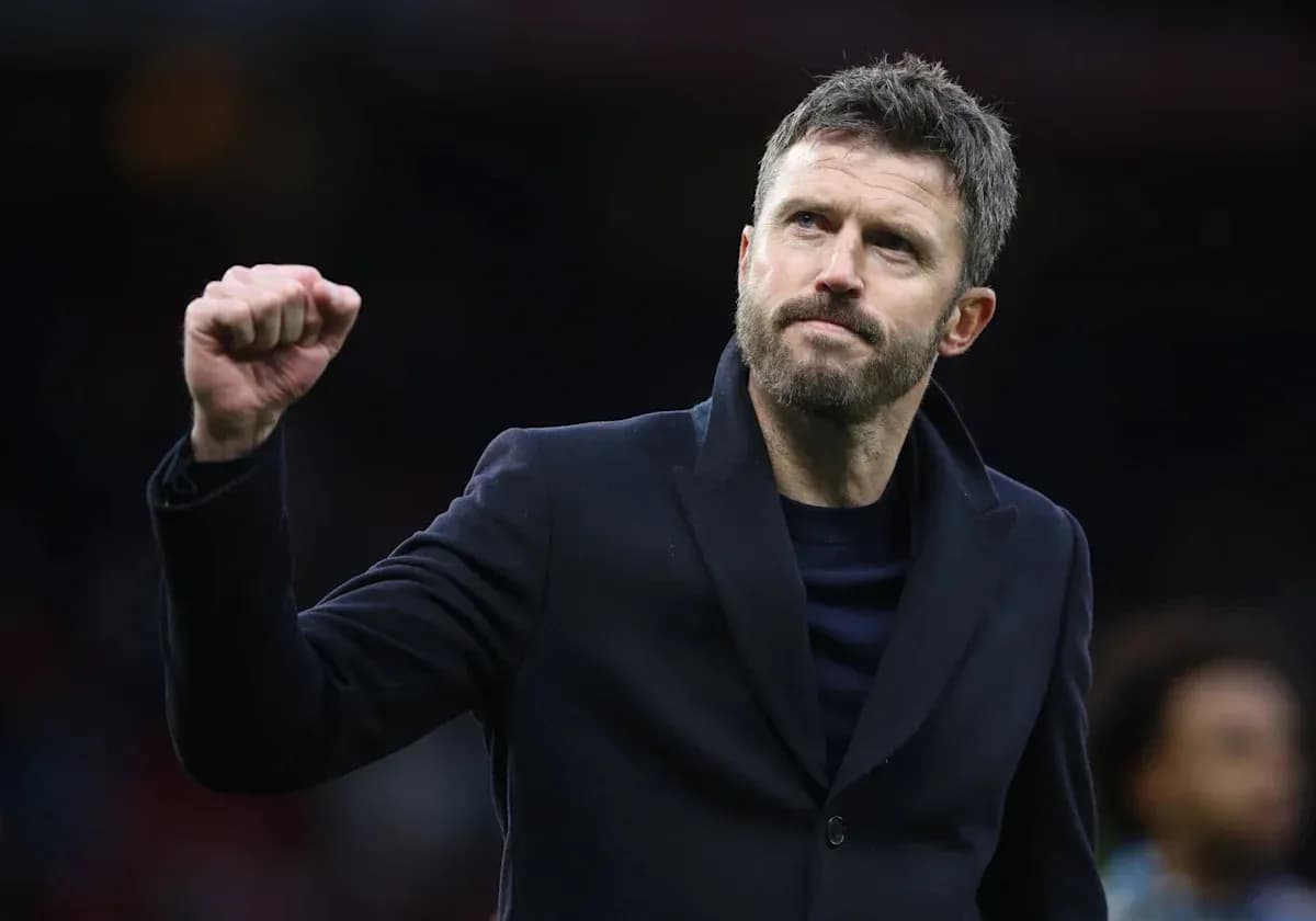 Coach celebrating with fist raised after match Coach celebrating with fist raised after match