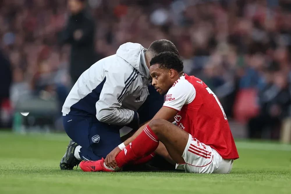 Player receiving medical attention on the field Player receiving medical attention on the field